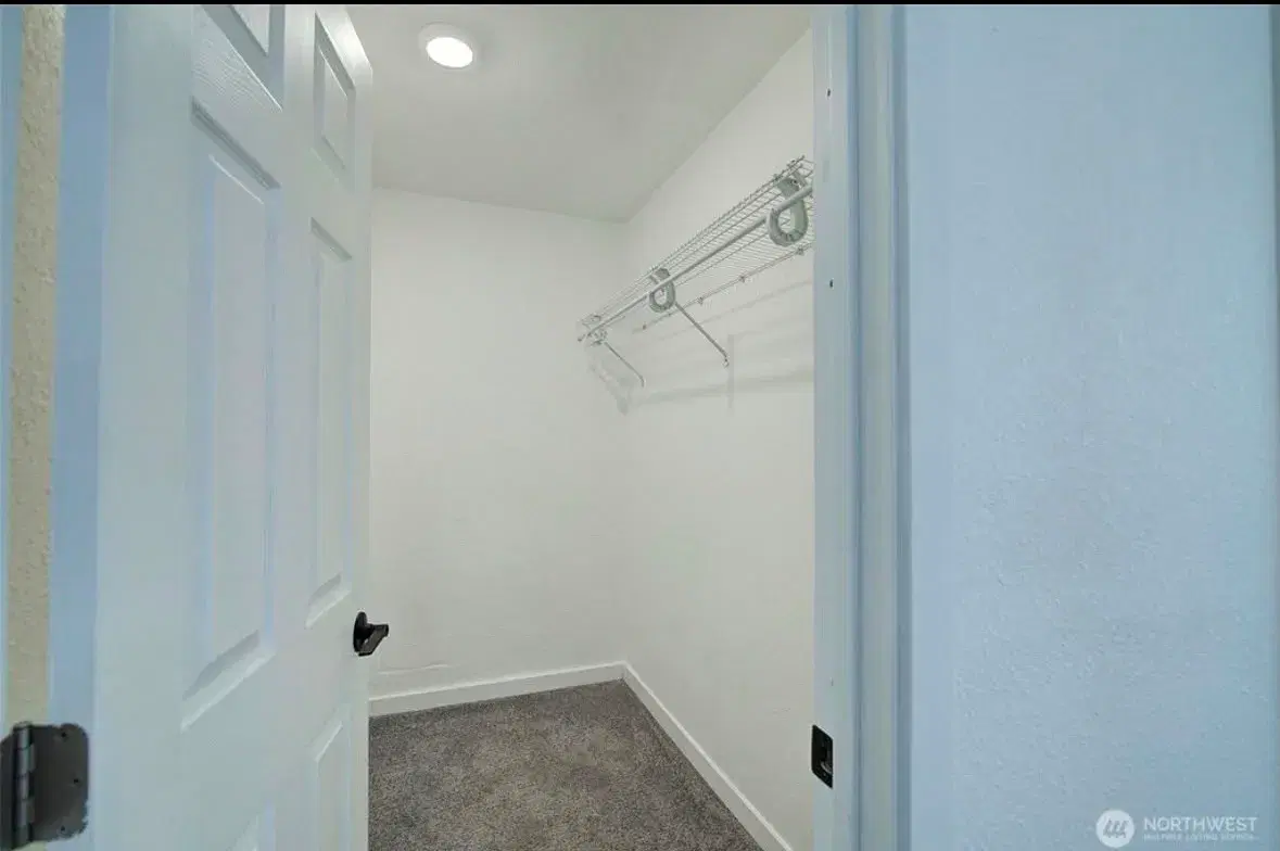 Walk-in closet with built-in shelving