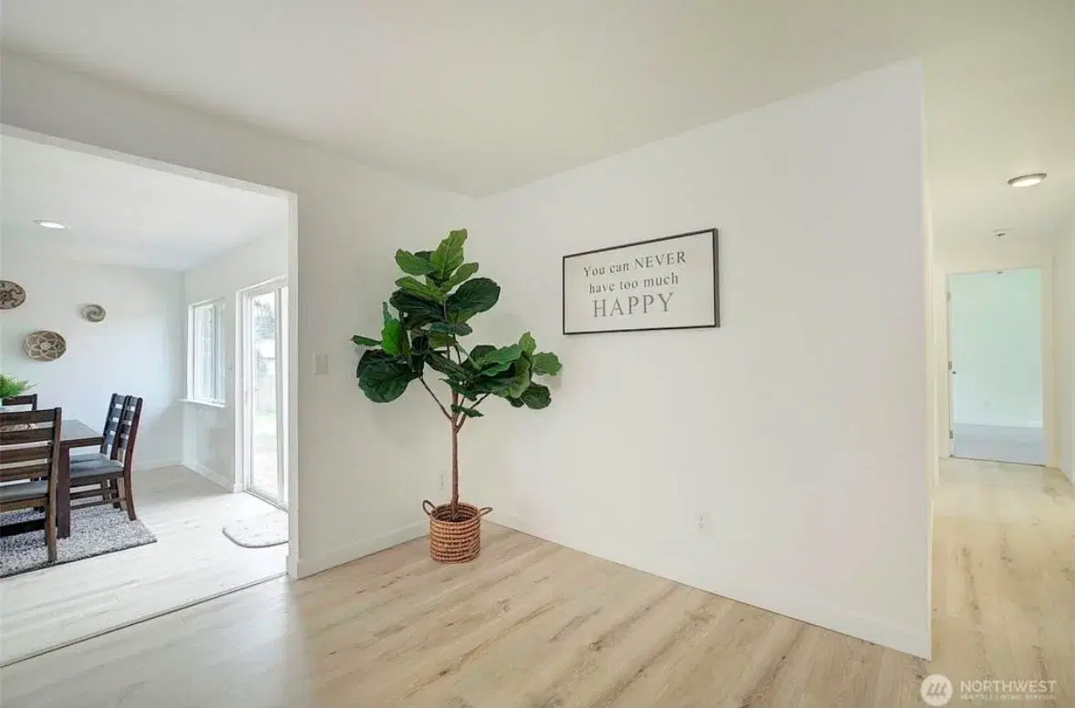 Light-filled entry hallway connecting the dining and living areas